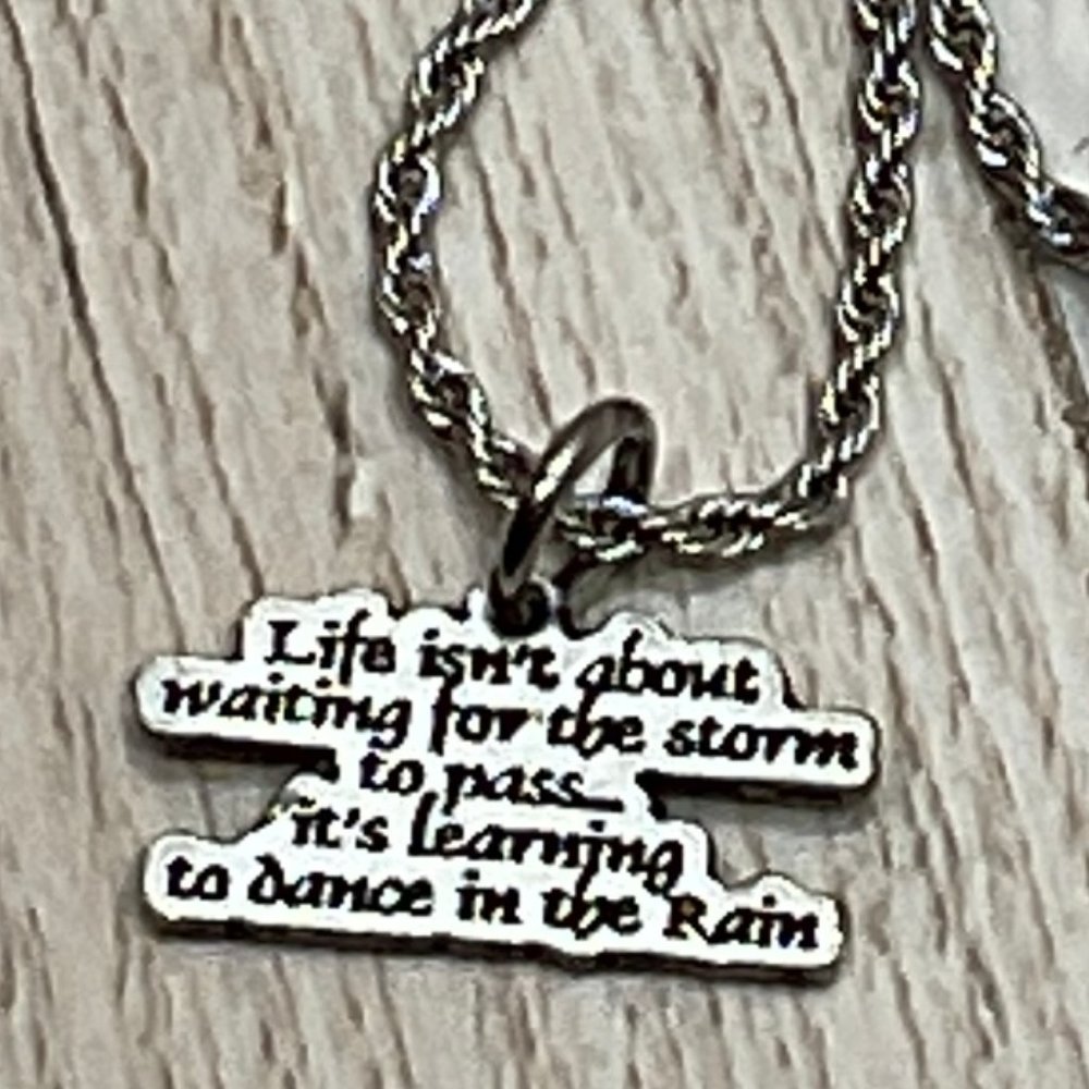 Life Isn't About Waiting For The Storm To Pass Single Charm Necklace